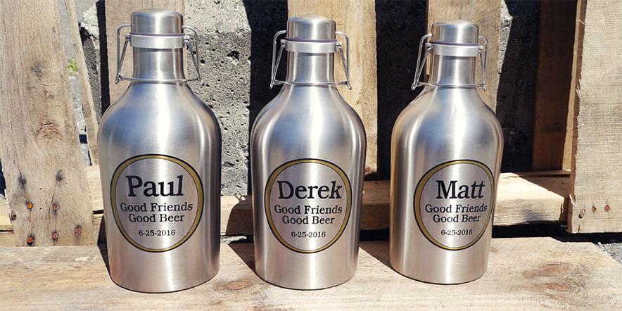 Three personalized growlers